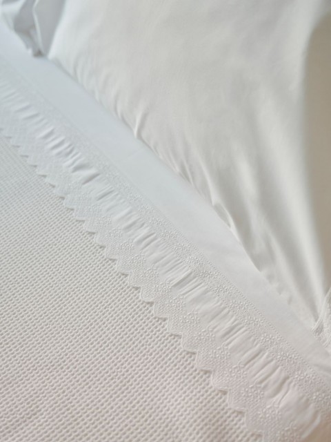 Set of embroidered percale...